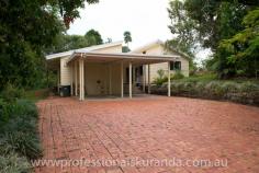  6 Outlook Cres Kuranda QLD 4881 $595,000 Almost 5 acres close to the Village House on Acreage - Property ID: 767789 This beautiful 4.7 acre property sits atop a hill at the end of a cul-de-sac and is only 5 minutes from Kuranda Village. Not far from shops and school for the kids. The property is fully fenced and is zoned rural residential so, you can keep a couple of horses or even some cows or goats. There are stables, a workshop and double shed to store feed or a vehicle. A permanent creek runs through the back boundary of this property to water the animals or even for a dip in summer! Wallabies graze on the grass and rest under the shady trees. The house is steel frame, hardy plank construction with 3 bedrooms, bathroom and ensuite off the master bedroom. There are built in wardrobes in all of the bedrooms. A recently renovated kitchen comes with a family size fridge. High ceilings, air-conditioning in the rooms and fans keep this house cool in summer. A combustion wood fired stove keeps the place warm in winter. In the afternoons you can sit on the timber deck enjoying a drink and the beautiful views of the rainforest on your property.  There is a small office, from which you could run your own business. A double carport is at the entrance to the house.  Solar panels have been installed on the roof and feed back to the grid. The Inverter is 5 kw The 26 panels are 6.5 Kw for extra performance It at times produces 35+ Kwh in a day Acreage properties close to town like this rarely come up for sale in Kuranda, so get in quick!  Print Brochure Email Alerts Features  Land Size Approx. - 1.76 hectares  4.7 acres  close to Kuranda VIllage  solar panels  permanent creek  mountain views  3 bedrooms 