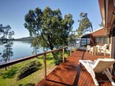  55 Point Circuit North Arm Cove NSW 2324 $1,050,000 Peaceful sanctuary in prime location - Over 1/2 Acre Whether you want to take the boat out or throw a line in you will marvel at the striking sunrise over the wide water outlook. Privately secluded from the street on over half an acre peninsula parcel of land, it captures breathtaking harbour views to Soldiers Point and Nelson Bay. A sun-soaked lawn extends to the water's edge. A family focused property set in lush tropical surroundings. In a class of its own, with emphasis on true connectivity between indoors and out, this home confidently delivers on architectural finesse, style and space. Featuring an open plan design where kitchen, dining and living rooms come together and enjoy a seamless transition to the outdoor deck, yard and foreshore. There is a flow and harmony to this home that is truly impressive. All bedrooms capture water views.  Features include: 45 metre water frontage 2 Air-conditioning Units Exceptionally large double garage with work shop Alarm System Motorised Awnings 3x5,000 gallon water tanks Eco header tank Property Details Price 	 $1,050,000 State 	 NSW Region 	 Port Stephens Suburb 	 North Arm Cove Postcode 	 2324 Property Type 	 House Bedrooms 	 3 Bathrooms 	 2.5 Carspaces 	 2 Land Size 	 2491 Square Metres 