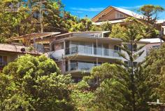  1/72 Tramway Rd North Avoca NSW 2260 $1,150,000 Property Description COMMANDING VIEWS Commanding great ocean views over North Avoca, Avoca Beach and beyond to Cape Three Points, this stunning vista is preserved yet ever-changing. Offering two Strata titled, Architecturally-designed and Master built units with absolute highest quality finishes and superb attention to detail. Caesarstone bench-tops, Italian marble tiles, Miele appliances, ducted air and heated flooring enhance the living experience. A short walk to both Terrigal and North Avoca beaches you can also enjoy the cosmopolitan feel of boutique shops and the latte set of Terrigal and Avocas cafes. Drive into your secure remote controlled garage – leave the car and enjoy the lifestyle… 