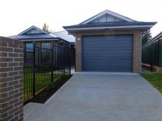  10/17 Marsden Ln Kelso NSW 2795 $380,000 A Special Place to Live 'Magnolia Manors' From the time you walk in the front door of this unit you will notice the generous living areas and you can see that this is not your normal unit, it is something special. There is a mixture of ceiling heights which adds to the spacious feel. The units main bedroom is featured with a generous En-Suite. Both the bedrooms have Built Ins. (The garage has Automatic remote doors).  Being a gated development, security is at its best. Each unit and the entire complex will be fully fenced. Ducted Electric Heating and Cooling is complemented with R2 insulation to the walls and R3.5 to the ceilings. Anyone living here will be comfortable in all the seasons and as economically as possible. The fixtures with this unit are quality. The kitchen has been designed with ease of use and cupboards in the right places. 20 mm Caesar Stone tops (naturally) , Omega 75 cm Stainless Steel Cook top, Oven, Dishwasher & 90 cm Stainless Steel Range-hood. Bathroom and En-Suite has Duraplex-Demeter Vanities with China Tops and Merrica Tap ware. Hot water system is BOSCH Instantaneous for maximum economy and efficiency. Type: Unit Bed: 2    Bath: 2    Car: 1     Building Size: 147.9 sqm (approx) 