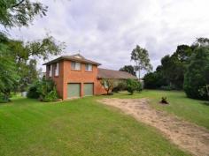  786 E Kurrajong Rd East Kurrajong NSW 2758 Spacious 4 bedroom home with views to Sydney and Blue Mountains on 10 acres. New kitchen, high ceilings, ducted air, wood fire in large downstairs living room, formal dining room. Additional upstairs living area with entertaining balcony over extended double garage. Relax under the pergola surrounded by established gardens, fish pond, orchard, veggie patch and hen house. 3 bay insulated steel shed with power, dam and bore for irrigation and 4 fenced paddocks. Well maintained property. All enquiries call Mitch Hurst 0414 379 399 For Sale Bedrooms:4 Bathrooms:1 Garages:2 