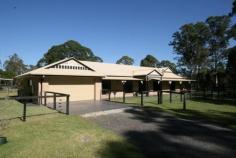  42/58 Teviot Rd Carbrook QLD 4130 Property ID 34427 With a lovely ,leafy outlook,this 5 year young family property has a long list of features including- *2.02 hectares of flat fully useable land-fully fenced and broken up into 3 paddocks *4 bedroom plus study family home-just 5 years old *en suite plus family bathroom plus powder area *9 foot ceilings a big feature *covered entertaining area-great size ^separate rumpus/billiards room with wet bar and WC ^double garage with remotes *triple garage for the boys toys *modern dcor and finishes throughout *too many features to list-come and have a look for yourself Land area 2.02Ha 