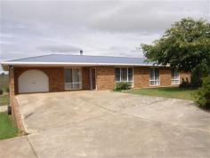  49 Main St Winnaleah TAS 7265 $240,000 Property Information This well presented three bedroom brick home is sure to please the fussiest of home buyers offering spacious, low maintenance living. Open plan kitchen, dining and living area complete with both wood heating and reverse cycle air conditioning. Glass sliding doors lead out from the dining area onto an undercover deck at the rear of the home which overlooks the garden and surrounding farm land in the distance. Three decent sized bedrooms all with built in wardrobes. Main bedroom with ensuite. Main bathroom includes shower and bath. Toilet and laundry are both separate. A second living area could ideally be used as a Rumpus room or Formal dining. Large securely fenced backyard with gate access and an abundance of fruit trees. There is a total of three lockup garage spaces, one with remote control roller door access and also a small lockup storage area. Positioned in a convenient location within a short walk of Winnaleah District High School, the General Store and Town facilities. Land Size 	 2630 sqm Approx year built 	 1989 Property Type 	 House 