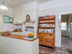  20 McLaren Flat Road McLaren Flat SA 5171 $595,000 - $615,000 Walnut Tree Cottage - Early 1940's Bungalow Looking for a hobby farm for the family or maybe a new business venture with a potential B&B or opening of a new Cellar Door (STCC)? This 3 bedroom original stone homestead has been well maintained and is surrounded by wraparound verandahs and gorgeous cottage gardens. Nestled into a vineyard setting on the edge of McLaren Flat is a lifestyle opportunity ready and waiting for its new owners. With 5.5 acres and a backdrop of vines location is without doubt a key focal point to this property. The vines, fruit trees and vegetable gardens are all supported by an excellent bore license. The hobby vineyard has been professionally self managed for over 38 years so why not sell some quality grapes for a little extra income! Vineyards consist of approx 1 acre of Grenache and 4 acres of Shiraz. There's numerous shedding, chook houses and bird aviaries on hand. This is country living at its best, within walking distance to the local primary school and a short drive to McLaren Vale and Willunga.   Property Snapshot  Property Type: House 