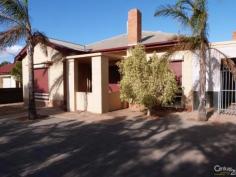  36 Daniel Terrace Port Augusta SA 5700 $169,000  36 Daniel Terrace, Port Augusta This lovely home of approx 50 years is the ideal place to move straight away into and enjoy, or will make the perfect investment with an anticipated return of $240pw - $260pw. There are 3 bedrooms, all of a good size, with the master having full length BIR's on two walls, making ideal storage. The kitchen features a walk-in pantry, gas hot plates and a good old fashioned wood stove which can be also used as a heater. Externally the carport is large enough for multiple vehicles, with a roller door, and there is access to the 20x30 shed, complete with lots of shelving and a cement floor. The property is fully fenced with a large rear yard, ducted a/c, roller shutters and is perfectly located as only a 10 minute walk to the CBD PROPERTY DETAILS $169,000  ID: 325247 