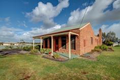  295 Southern Cross Road Illowa VIC 3282 ATTENTION: Tradies or FamiliesSituated midway between Warrnambool and Koroit is this solid brick home, ideal for a family or the handyman/ tradie. Situated on one acre, this solid brick home consists of 4 Bedrooms, 2 bathroooms (master with ensuite), kitchen/dining, living room with coonara wood heater, enclosed alfresco living and double garage. There is a 60x30ft workshop with pit, additional shedding, bore and 16,000ltrs rain water capacity. A neat cottage garden with 3ft hedge is along the road side, plenty of yard for children and pets and established gum trees surround. Internet ID 317937 Property Type House Features Heating - solid, Secure parking, Built in robe/s, Workshop, Shed, electric hot water service 