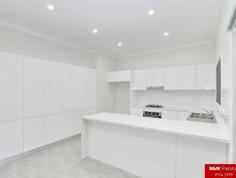  75 Turvey St Revesby NSW 2212 offers over $980,000 Why Build? When all the hard work is done! This magnificence brand new light filled north-facing home is only attached by garages and sits on a huge 403sqm of land (Approx.) . Boasting 5 bedrooms plus Study, 3 luxury bathrooms and Separate lounge & dining area. You will also be impressed by the enormous gourmet, feature packed kitchen off huge undercover entertainment area and low maintenance child friendly yard.  Property features include:  • 5 Generous sized bedrooms all with built-ins, including 2 rooms down stairs.  • Large master bedroom with walk-in robe, classy ensuite & private balcony. • 3 Quality bathrooms including 1 down stairs to accommodate the 2 rooms  • Large tilled lounge room with gas bayonet, plus Separate dining area. • Huge under cover entertainment area overlooking large level yard • Laundry large enough for ironing board plus storage & external access. • Glamorous kitchen unbelievable in size with stone bench tops & breakfast bar • Other features include Gas cooktop, duct range hood & ample cupboard space.  • Dual video security monitor, Alarm system, powerful duct air conditioning.  • Remote control garage, Minutes to bus services, M5, local shops & schools DETAILS ID #: 0000268715 Price: offers over $980,000 Type: House Bed: 5    Bath: 3    Car: 1     Land Area: 403 sqm (approx) 