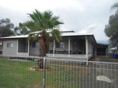  23 William St Roma QLD 4455 $320,000 Great Street with a Great Home Fully air conditioned 3 Bedroom home. All bedrooms are carpeted & have built in cupboards. The bathroom is tiled & has a shower over bath, corner vanity & toilet is separate. Kitchen is modern and tiled. Natural gas stove & gas point for heating. Dining room flows through from the kitchen & into a large lounge room. Front deck & rear paved entertaining area. Double lock up shed with double carport. Adjustable stumps & near new roof. Natural Gas is connected. Security screens on doors & fly screens on windows. Established lawn. 1012 sqm block fenced front and back. 