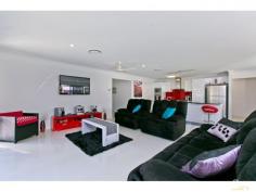  37 Spotted Gum Mount Cotton QLD 4165 Inspection a Must! Inspection Times: Sat 22/08/2015 10:00 AM to 10:30 AM DON'T Miss Out On Inspecting this outstanding home.  Ready for the person looking for peace and tranquillity, with the ease of having all necessities close by.  The kitchen is perfect for entertaining guests and family, it has a huge island bench (stone benchtops), outfitted with top of the range Blanco Appliances, including Induction Cook top and dishwasher.  The Master bedroom over looks the pool area and includes a huge walk-in wardrobe and large ensuite. All bedrooms are generous in size with big Built ins. Massive walk in linen and storage cupboard. Ducted Air conditioning throughout the home.  The generous open plan living area opens up onto the covered alfresco deck, allowing effortless year-round entertaining. This area, overlooking the sparkling In ground pool, low maintenance, landscaped gardens with lush grassed areas in both front and rear yard.  Great electricity savings with 12 solar panels, 5000 litre water tank, 6x4 garden shed, Double remote garage with storage, crimsafe security screens and doors.  You will be impressed! Guaranteed! PROPERTY DETAILS Offers Invited NOW! ID: 332484 Land Area: 715 m² 