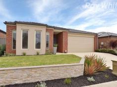  52 Ardent Cres Cranbourne East VIC 3977 $395,000 - $440,000 A Modern 4 Bedroom, 2 Bathroom Home in the 'Hunt Club' Expertly crafted by Carlisle Homes less than 5 years ago, this home in the multi award winning Hunt Club estate is designed with a young or growing family in mind. Just metres away from a beautiful park and with buses, a new shopping village and more in the estate you hardly have to leave but when you do you can also access Casey Fields, Cranbourne East primary and secondary schools plus central Cranbourne in minutes. Young, fresh and modern, the home features a formal lounge room as well as an open and tiled family/meals area incorporating the kitchen with stone benches, a walk in pantry and stainless appliances. There are 4 robed bedrooms including the master with a walk wardrobe and a full ensuite to match the family bathroom and second toilet. Extras include ducted heating and evaporative cooling, a double remote garage with internal access and fully landscaped gardens including the spacious backyard with covered alfresco area and extended deck. 