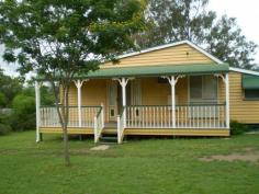  14 Mangerton St Toogoolawah QLD 4313 $189,000 Quaint, Character Home on 1168m² Positioned in Toogoolawah is this neat home offering 2 bedrooms and 1 study. The home has open plan kitchen /lounge/dining, ceiling fans, air conditioning, gas cook top & oven, front verandah and back porch. The property has a double colorbond shed and is set on a 1168m2 block. Don't miss your opportunity to secure this neat package. 