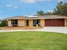  4 Landers Rd Lesmurdie WA 6076 $575,000 To $589,000 ' Just Sensational" SERIOUS PRICE ADJUSTMENT!!! Stunning 4 bedroom, 2 bathroom home set on a well maintained 887sqm block in this quiet location easy walk to shops & transport and St Brigids college,also short drive to Lesmurdie Shopping Centre, Lesmurdie High, Walliston Primary, Kalamunda Christian School and Mazenod Boys School. The Home is of excellent presentation, modern kitchen & bathrooms, slow combustion heater, ducted evaporative air conditioning with a slit system reverse cycle in the lounge, quality floor covering, curtains & blinds,double garage with auto door and a bonus of 8 solar panels. Outside there is pleasant alfresco area, really neat ,easy care garden, very child and pet friendly. This beautiful property will suit first home buyers investors and is the perfect "downsizer", come along and view, inspection will impress. For further information and to view please call me at any time. * 4 bedrooms *2 bathrooms * quality throughout * modern kitchen with dishwasher * formal lounge & dining *ducted air conditioning * double garage with auto door * solar panels * neat easy care gardens * great location *887sqm block 