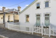  13 Paternoster Row Hobart TAS 7000 $495,000 From the stylish 13 Paternoster circa 1835 facade, the casual observer would never guess at 3 levels of living space within and a sunny garden enjoying elevated views across Argyle Street to the Glebe. Substantially constructed of stone and brick with a rendered finish, 13 and the neighbouring 11 Paternoster Row are a conjoined, matching pair on separate titles with shared Argyle Street access as an added bonus. With feature lead light over the entrance, on this level the master bedroom at 13 Paternoster has built-ins and adjoins a generous size, well ventilated bathroom including spa bath and shower over, plus a hide away laundry off the bathroom and with plenty of storage cupboards all on this level. The decor throughout is one of neutral tones and with the usual high ceilings and panelled doors of the era adding character. A quaint staircase ascends to 2 unique attic bedrooms upstairs while downstairs are the living areas. A large and well equipped kitchen with slate floor opens into a relaxed dining area to one side and a comfortable TV / lounge room on the other. Off the lounge is a secure, flagstone paved courtyard on the Paternoster side of the property.  Meantime, double doors from the dining room open onto a sunny, paved terrace in the private garden, just perfect for breakfast outdoors on the weekends or summer evening barbeques with friends and family. A small timber studio in the garden provides extra storage outside for personal effects or bikes, which can enter the property from the Argyle Street entrance.  Currently tenanted, the property is in sound structural condition and is a fine example of a heritage townhouse of the era. Positioned midpoint between Hobart and North Hobart, the property is close to schools, North Hobart and CBD shopping, theatres and restaurants and is an easy walk to work in the city, or weekend markets and festivals.  STATUSFor Sale PRICEOffers Over $495,000 ADDRESS13 Paternoster Row SUBURBHOBART PROPERTY ID2940384 INSPECT›  Saturday 24th October 10:30am - 11:00am LAND SIZE 217 M2 