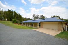  21-23 Cherry Tree Court Canungra QLD 4275 $699,000.00 Negotiable "SURE TO IMPRESS" All that you have ever dreamed of is here in this magnificent; 371m2 four bedroom home, all with built in robes, the master with a large walk-in and ensuite. The Architect designed home has been especially cherished by the current owners, with almost four acres of beautifully maintained and manicured gardens with a large Dam & pump that irrigates the gardens, with a separate huge area for growing Organic Vegetables, with mature trees giving sufficient shade for those warm summer days, yet open enough to enjoy the clear moon and starlight evenings, this is a property you must inspect! When you walk through the double front doors into the entrance Foyer of this spacious home with fully tiled floors to all living areas, the open plan home has been designed as an entertainer, with open plan kitchen with island benches, with a dish washer, a large dining area / sunroom that overlooks the 10 X 6 mtr salt chlorinated in ground pool and large undercover entertainment area.  A Double Garage with remote controlled doors. Plus a separate 6X6 mtr Colourbond Double garage, and a detached cubby house or office. This property is situated in the Gold Coast Hinterland a short 5 minute drive from the popular Country Town of Canungra, which is a comfortable 20 minute drive to Nerang & the Pacific Hwy.   Broadband, Built In Robes, Courtyard, Dishwasher, Ducted Cooling, Ducted Heating, Ensuite, Fully Fenced, Grey Water System, In Ground Pool, Open Spaces, Outdoor Entertaining, Pay TV, Secure Parking, Shed, Solar Hot Water, Solar Panels, Water Tank, Workshop, PROPERTY DETAILS Price $699,000.00 Negotiable Property Type House Land Size 1.5900 Hectares Property ID 2956523 4 2 4 