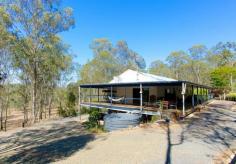  58 Outlook Dr Esk QLD 4312 $450000 You must take time to see this Beautiful Home that will please even the fussiest of buyers. Set on a 4 Acres with potential of Subdivision this spacious quality home Features:  * 4 Large Bedrooms with big Main and walk-in robe * Polished Hardwood Floors, Huge Bathroom with Bath and Walk-in Shower * Spacious Open Plan with Impressive Timber Cathedral Ceilings  * One Off Solid Timber Hand Made Kitchen with Walk-in Semi Butlers Pantry * Fire Place and Air Conditioning  * Large Verandahs on 3 Sides over looking property ( Great Entertaining) * Under the house you have a large workshop with many wood working tools that may be included in sale( subject to Neg )  * 2 Bay garage under house with Kitchenette, Bathroom and Toilet * 12m x 9m Concreted Shed with Power and Water  * Carport for Caravan or Motorhome  * Veggie Garden, Dam with bridge, 3 x Tanks  * Only Mins To Esk Township on Quiet Cul-De-Sac  You Just Have To See The Quality For Yourself FireplaceVerandahSelf-contained accommodationDamSmoke AlarmsSafety SwitchGas stoveRange hoodDishwasherAir conditioning Bedrooms 		 4 Bathrooms 		 2 Garages 		 5 Car Ports 		 1 Land Area 		 1.6 ha 