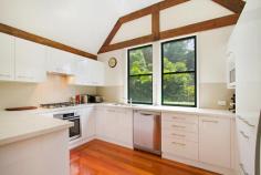  30 Albert Evans Dr Worongary QLD 4213 $699,000 plus! Property ID 45277 A dream home for a couple wanting privacy, space, and a touch of quality. Located in a quiet leafy cul-de-sac only minutes from town, you can relax in total seclusion and enjoy the natural rainforest as your view. There is also a separate studio offering dual living potential. * 3 bedrooms plus study, 2 bathrooms * Gorgeous open plan living areas with 3.7 metre high ceilings  * Flowing indoor/outdoor living areas, perfect for entertaining * Large picture windows provide lots of natural light and a beautiful view * Wake up and see the trees not neighbours * Quality custom made timber doors open to wide deck * European kitchen includes 40mm stone tops, glossy cupboards, and gas cooking * Hardwood timber floors add to the ambience * Reverse cycle air-conditioning for year round comfort * Combustion wood fire - lovely in winter  * 6 x 9 metre Titan shed with internal bathroom - ideal workshop, studio, or dual living potential * Remote controlled entry gate, plenty of parking space * Low maintenance 5,048sqm block, fully fenced 30 Albert Evans Drive is conveniently located with easy access to superb shops, restaurants, and beaches. The unique European chalet inspired design provides the perfect tree change opportunity, but not for long, as the sellers are packed and ready to move, so act quickly. Land area 0.50Ha 