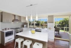  12 Tomaree Cres Woongarrah NSW 2259 $669,000 746 SQM BLOCK - STUNNING POOL $669,000 This stunning home is designed for those who like to entertain. Featuring a covered entertaining deck overlooking the sparkling in-ground pool and still plenty of lawn for the kids to play. Internally the property has 4 bedrooms with en-suite and WIR to main, formal lounge with vaulted ceilings and rumpus room, brand new kitchen incorporating stone benches to stainless steel appliances and magnificent stove for the entertaining parties, 2 x air conditioning as well as a double garage with remote entry and side access for the camper trailer and boat.  This property is amazing and all a family could want for. It is a must to inspect. Property Type House  Property ID 11650100509  Street Address 12 Tomaree Crescent  Suburb Woongarrah  Postcode 2259  Price $669,000  Land Area 746 sqm 