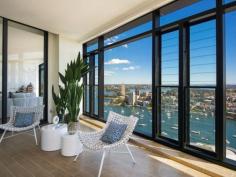  80 Alfred St S Milsons Point NSW 2061 6 Million Live Like a Celebrity… Alongside the Harbour Bridge The time has finally arrived......your truly once in a generation opportunity to acquire a spectacular Skyhome or Penthouse in the recently completed Bridgehill Residences located at 80 Alfred Street, Milsons Point. Gracefully perched alongside the Sydney Harbour Bridge, your choice of four meticulously crafted luxury penthouses created for people who want spacious and gracious living, occupying the entire half floor of the upper levels and range in size from 200m2 to over 280m2 of internal areas with additional external areas of up to 125m2. By day, the expansive terraces allow residents to soak up the sunshine and the sparkling water vistas, while at night Sydney lights up and the stars put on their private show. From the private living areas you can watch the world go by and not worry about being seen. The Harbour Bridge looks statuesque against the city skyline, the lights of Luna Park twinkle their happy welcome, and sailing boats bob atop the cobalt waters of Lavender Bay. Designed by the internationally-acclaimed architects SJB, each penthouse has the feel of a luxurious single-level house, with three large bedrooms - most with private ensuites an additional study room, a powder room, ducted air-conditioning, and two secure car spaces plus basement storage. Each kitchen is the epitome of indulgence, with a timber-framed island bench, thick stone benchtops and a full suite of Miele appliances (860mm-wide gas cooktop, 600mm-wide electric pyrolytic wall-mounted oven, combi oven/microwave oven, rangehood, integrated dishwasher and refrigerator) and an espresso coffee machine. The large functional kitchens are positioned to gain views and enable the chef to be part of conversations in the living and dining areas. Each lavish master ensuite has a sumptuous freestanding bath, a luxuriant shower with a frameless glass screen, a wall-mounted vitreous china vanity and luxurious tapware. 