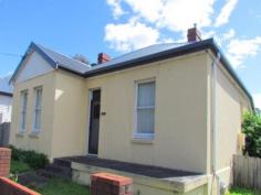  203 New Town Rd New Town TAS 7008 $350,000 Located opposite Ogilvie High School in the heart of booming New Town, on the bus route and easy walking to two super markets, cafes, shops, post office, restaurants and doctors. Built in the early 1900?s this 3 double bedroom house is rendered solid brick and on level 653m2 of land. Comprising of a formal lounge, wide Tas Oak entrance hall, and 70?s style kitchen, with high ceilings, picture rails and other character features. There are two toilets, separate laundry, lots of off street parking at rear plus a double carport. With a new Colorbond roof, mains gas connection (with gas hot water) and plenty of scope to improve. Currently rented at $370pw with lease about to expire so vacant possession can be offered. New development happening close by which will improve the site value greatly, now is a fantastic time to pick up this property at this amazing price. Call Neville Crowther now for this fantastic opportunity! Inspections Inspections by appointment only. For Sale OFFERS OVER $350,000 Features General Features Property Type: House Bedrooms: 3 Bathrooms: 1 Land Size: 653 m2 (approx) Outdoor Open Car Spaces: 2 