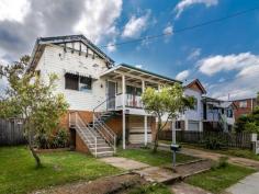  77 Earl St Greenslopes QLD 4120 $580,000 Renovator's Delight + Business Potential Here is a great opportunity to secure a true gem in the heart of Greenslopes.  Add your personal touch to it to make it your own masterpiece.   Defining features for this home include: 539 square metre with 13.5 metre frontage 2 good sized bedrooms with a sleep-out and 1 bathroom 2 living rooms 1 spacious kitchen and a dining area Fans in the bedrooms, living room and kitchen Hardwood floors throughout 3.2 metre high ceiling upstairs A lockup garage and a laundry room downstairs 2.4 metre highest point and 2.1 metre lowest point downstairs Plenty of room downstairs for improvement Massive yards around the property for your children and pets 120 square metre upstairs internally 110 square metre downstairs internally Nestled in an enviable Greenslopes main road position, this home offers you all the convenience you need.  Due to its position and exposure to the public, this home has the potential for a business from home.  Access to bus stops is a breeze since it is right in front of the property.   This home suits everyone from owner occupiers to investors.  Call today to arrange an inspection.  Marketed by Reval Estate Agents. Property Features  Hardwood floors throughout  Spacious kitchen and a dining area  A lockup garage   2 living rooms Property Type House Land Size 539m2 Suburb Greenslopes Open Times Saturday, 5th December 9:30am to 9:55am 