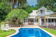  145 Repentance Creek Road Goonengerry NSW 2482 $1,550,000 Dreams Do Come True! Lifestyle - Property ID: 832686 This is a once in a lifestyle opportunity that should not be missed.  Located in the exclusive Byron Bay Hinterland are "Rosebank Farm" and "Valleydale Cottage", both oozing with the charm and appeal of yesteryear.  With 90 acres of rolling green pastures, rainforest and meandering creeks, the simplicity of country life is apparent, with total privacy, clean air, nature and uninterrupted views.  Beautifully restored, there is a delightful, original homestead (Circa 1895) featuring teak floors, French doors, lead-lights, high ceilings and lovely period detailing. The hub of the home offers spacious open-plan living, with a modern country style kitchen, dining area and a lounge room with a large fireplace. This open-plan space flows onto a stunning outdoor entertaining deck, overlooking the in-ground swimming pool, gazebo and gardens. There are 3 bedrooms, 2 with access onto the warp-around verandah, with views over the front gardens. Upstairs is the 3rd loft-style main bedroom, which has its own private balcony, offering a quiet retreat to sit and take in magnificent views to distant hills and sunsets. The bathroom is most inviting, with a high-back, claw foot bath.  The lush manicured gardens enveloping the home, provide secret spaces to read and unwind. There are also two good sized spring-fed dams and a three vehicle garage and workshop to tinker in.  This property also offers an easy-to-run tourism accommodation business. "Valleydale Cottage" is totally private, and separate to the main home. It is located in the middle of the 90 acre property. This gorgeous 1 bedroom Queenslander-style cottage is fully approved as a self-contained tourist facility. "Valleydale" is a romantic getaway retreat that has been operating for 14 years and enjoys an incredibly high occupancy rate - well above average, with a high percentage of this occupancy made up of returning guests.  With the current nightly tariff of $295.00, it provides substantial financial returns, resulting in an enviable lifestyle.  Booking statistics for the past 3 years are available on request.  For those wishing to expand the business further, there is an approval in place for a second cottage and the zoning of the property, which means that there is potential for a total of 6 x 2 bedroom or 12 x 1 bedroom cottages (STCA).  A Town Planner's Report for the property is available on request.  With far too many features to list here, we invite you to inspect the property first hand to truly appreciate its uniqueness, charm and future development potential.  In summary, this unique property offers so many options, from the expansion of the existing and very successful accommodation business, to multiple occupancy, horses, cattle or crops, such as Macadamias and Coffee. The property is rated for primary production.  Forward bookings are locked in to the next 12 months and beyond.  To view the "Valleydale Cottage" web site, copy and paste this link into your browser: www.valleydalecottage.com   Print Brochure Video Email Alerts Features  Located in Byron Bay Hinterland  Main homestead plus cottage  Main homestead with 3 bedrooms  One bedroom Queenslander cottage  Approved toursit facility 