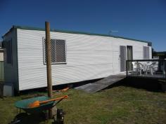  46 Grovers Ln Glen Innes NSW 2370 $72,900 SOMETHING DIFFERENT * 920m2 fully fenced block in town * Power, water & sewerage all connected * An Atco Hut has been fitted out with a bedroom, living area, shower (nearing completion), toilet, tub & washing machine * North facing deck in the process of being built * The sale also includes a shipping container WALKING DISTANCE TO TOWN $72,900 Bedrooms 	 1 Bathrooms 	 1 Garage 	 0 Flooring 	 Land Content 	 Land Size 	 920 Square Mtr approx. Units in Complex 	 