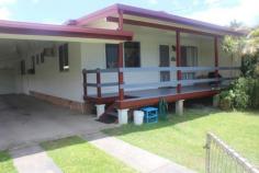  26 Jackson St West Mackay QLD 4740 $425,000 neg Property ID 43381 A real family affair with 4 bedrooms plus study or 5th bedroom including a separate parents retreat / extended family area and a fully screened sunroom at the rear enclosed by crimsafe and lockable. Situated in West Mackay in a quiet street close to all facilities including hospital this is one property that is a MUST VIEW. Several carports, enclosed and lockable workshop, 2 bay shed plus annex and possible side access. Rainwater tank for the stunning gardens which offer privacy and for the gardening enthusiast there is a shade house and lawn locker. The kitchen is a chef's dream" with a stove that is rarely seen in domestic homes and modern styled throughout. Recently painted through out and re-furbished this is one home ready to move into now and enjoy. This one must be top of your list to view. Land area 0.08HaAir Conditioning 