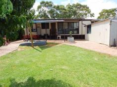  14 Carrickalinga Rd Carrickalinga SA 5204 $289,000 So many appealing features here on offer, peaceful views directly opposite to the open fields & rolling hills & within an easy 8 minute stroll to the beach or a fun bike ride or jog along the bike trail back into Normanville. This home is so neat & tidy, fully landscaped & fenced plus it offers an amazingly high & spacious carport to cater for undercover parking of the largest fishing boats or caravans. I know you will just adore the brand new luxurious family bathroom, so modern & well designed while the main living areas are open plan & make for easy entertaining. The central kitchen boasts a Dishwasher & there is R/C A/C plus a big wood heater for comfort all year round. The master bedroom is enormous & there are BIR's. The rear paved pergola overlooks a green lawn, fruit trees & raised vegie gardens, with a useful garden shed & garage that has been set up as the ultimate tradies workshop or mancave. Priced to sell promptly at great value for money!   Property Facts Property ID2991644Property TypeHouse For SalePrice$289,000Land Size697 M2House Size-Council Rates-Water Rates-Strata Levy-Tender Date N/A 