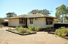  15 Edwards St Port Augusta SA 5700 $154,000 NEAT AND TIDY HOME 3 1 1 Three bedroom timber framed home built in 1974. Approx 93m2 in size and situated on a corner block totaling 690m2. In a good location surrounded by a mixture of privately owned and DTEI housing. Features include ducted evaporative air conditioning, good size “L” shaped lounge and dining room with wall unit air conditioner, ceiling fans to all bedrooms, original bathroom with separate shower/bath and upgraded kitchen. Externally there is a small back veranda, double garage and low maintenance gardens. The property is fitted with a smoke alarm. Additional information Property Type House  Property ID 11735100291  Street Address 15 Edwards Street  Suburb Port Augusta  Postcode 5700  Price $154,000 