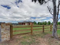  127 Reid Dr Wurruk VIC 3850 $525,000 Unique Quality Home on 4000m2 Modern family home with a difference, set on 4000m2 and only minutes to Sale CBD. Set off with stone pillar entry and solid timber rail fencing this quality built brick veneer home has a large entry way with full wall glass window with unique water feature and solid back drop. The wide hallway has solid timber flooring flowing through to the kitchen / family and meals area. Off the hallway is a formal lounge with large corner feature window and lovely colour toning's.  The main bedroom is quiet spacious with carpets, ceiling fan, large walk in robe and ensuite with separate toilet, vanity and shower plus a door way to the outside yard. Off the hallway there is also a good size study with built in desk, shelving and plenty of natural light flowing in. The other three bedrooms are all of a good size with carpet, built in robes and ceiling fans.  The second bathroom features tiled flooring, separate shower, generous size bath and a separate toilet. The home also features plenty of storage cupboards throughout. The modern kitchen and meals area features solid timber flooring, 6 burner gas hot plates, electric omega double oven, dishwasher, glass splash back and butler's pantry with loads of storage space. There is access from the meals area onto a covered alfresco area. Another feature of this lovely home is the North facing floor to ceiling windows in the family room which also has Cathedral ceilings.  There is a double garage under the roof line with direct access to the house, remote control door and storage shelves. The yard is fully fenced with edge drive way and large colour bond shed of 99m2 with 2 high entry roller doors and concrete flooring. A well built, well decorated and maintained home with many added features including ceiling fans, ducted heating, reverse cycle air conditioning and ducted vacuum system.   Property Snapshot  Property Type: House Construction: Brick Veneer Features: Built-In-Robes Ceiling Fans Dishwasher Ensuite Storage Study Walk-In-Robes 