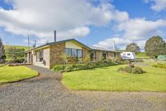  186 Old Mount Hicks Road Mount Hicks TAS 7325 $465,000 - $480,000 Make a grand escape today to this classy family home with ensuite & granny flat Travel up this beautiful tree-lined driveway , tucked away in the hills, just a short 4 minute drive to the Wynyard township and Burnie/Wynyard airport sits this inviting country property.  The home boasts a huge open plan kitchen/living area with walk-in pantry, 3 large bedrooms, ensuite plus a neat little 1 bedroom granny flat (attached) with all modern conveniences. Many sheds and outbuildings including cattle yard, chicken coops and two outdoor sitting areas one with in built fire pit complete this package! All set on a productive farmlet of 24 acres (approx.) with ample water including two dams & a couple of water tanks. Currently running goats, cattle, geese and chickens. Enjoy the beautiful country lifestyle and the rolling mountain views/ Rental appraisal for Granny flat - $150 per week. General Features Property Type: House Bedrooms: 4 Bathrooms: 3 