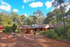  6 Humphry Rd Mundaring WA 6073 $599,000 - $649,000 DELIGHTFUL FAMILY HOME Looking for something peaceful and quiet and yet still only minutes to facilities? Seeking artistic inspiration? Wanting to unwind after a hard day’s work? Wishing to escape the hustle and bustle of city living? Wanting to get back to nature? Then this peaceful 3472 sqm block with bush reserve on one side could be the answer. The property offers a spacious 4x2 brick home with study/office, large shed with double carport and a brick workshop. Listen to the birds sing, and marvel at the abundance of new wildflowers, breathe in the fresh hills air and enjoy the peace and quiet that goes with living a true hills lifestyle. FEATURES • 	 Brick / tile 4x2 plus study built  • 	 Large master bedroom with huge dressing room / baby’s room • 	 Modern kitchen and updated laundry • 	 Formal large lounge and dining • 	 Large master bedroom with renovated ensuite and air huge dressing room / baby’s room attached • 	 Secondary bedrooms with BIRs • 	 Carport under the main roof • 	 Rear patio/pergola • 	 Colorbond shed with double carport attached • 	 Small brick workshop with 3 phase power • 	 Easy care 3472 sqm block with native gardens & gazebo • 	 Close to Mundaring village • 	 Easy commute to Midland & airport Set well back from the street, this private home offers a large master bedroom with a new elegant ensuite and a huge dressing room / baby’s room attached. The secondary bedrooms, main bathroom and separate renovated WC are towards the rear of the home. The study/office could easily be used as yet another smaller bedroom.  The hub of the home is the open plan living area comprising a modern kitchen updated in recent years with views out to a pergola at the rear. Beautiful solid timber floors are an attractive feature of this open plan meals and family area with a s/c wood fire and air conditioning. Formal living areas are provided with the carpeted L shaped lounge and dining area. Outside is a brick workshop with 3 phase power and an as new colorbond shed complex comprising a double garage of 6m x 7m with a similar sized double carport attached and to the front. The roller doors to the shed are at different heights to accommodate higher vehicles etc  Easy care native gardens surround the house and a smattering of citrus trees are overflowing with fruit. Located in a quiet street, close to Mundaring village and an easy commute to Midland and the airport. Start the adventure today. Call for more details or an inspection. Be quick for this one. Other features: Built-In Wardrobes,Close to Schools,Close to Shops,Fireplace(s),Garden,Secure Parking,Shed Property Details Elders Property ID: 8572721 4 bedrooms 2 bathrooms 6 car parks Land Area 3472 square metres Car Parks: 2 Double garage Double carport Air Conditioning 