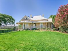  5 Barramundi Way Aldinga Beach SA 5173 $780,000 Historical Federation Villa Farm house is now on the market! House - Property ID: 839854 Originally owned by the Pridham family, this local heritage listed property is believed to have had its foundations go down in the 1870's and the homestead built around 1900. Still on 1447m2 of land, a significant portion, in today's standards, the home includes a large return verandah, with projecting bays, high cast iron verandah posts, brackets and frieze and detailed moulded brick chimneys. The walls are constructed of face stone with brick quoins and plinth which may have been painted.  Internal and external renovations have been carried out so it retains most of its original elements; a wide entry passage way features an arched leadlight window and leads you through this grand old home, where it features a large number of its original architectural fittings and fixtures. The decorative pressed metal ceilings and cornices are stunning, with picture rail, polished timber floor boards, timber doors, and architraves, timber skirting boards and the lead light panels to the main entrance are a real feature.  Fourteen foot high ceilings and massive internal walls are through out the original part of the homestead, which includes four antique marble fireplaces. The home was extended over the years, and now consists of three large bedrooms, a formal dining room, a huge lounge, central bathroom and the kitchen/meals. There is a free standing laundry that's as big as a bedroom, and steps to a cellar under the meals area that would be ideal for wine storage, this really completes the property. The kitchen/meals area is spacious and totally modern, with quality tiled floors, and ample bench and cupboard space. The kitchen includes a double sink, under bench oven, stainless steel two draw dish washer and a Gaggernau cooking system with deep fryer, hot stone barbecue and ceramic hot plates. The modern bathroom with claw foot bath tub, toilet, sink and shower alcove is accessed through an open arch with a dual built in linen press. The grounds are still quite spacious with several shady trees to keep the heat off during the summer months and an abundance of plants, small shrubs and lovely green lawns. A large gable toolshed is at the back of the home for storage and sections of the yard have been fenced off to provide secure areas for pets and children. The property is in the hub of the suburb, close to major shopping, schools and public transport and only a few minutes to beautiful Aldinga beach. For further details on this unique property that are rarely available to purchase, or to arrange an inspection by appointment, please call the selling agent Brian Pounsett on 8382 3773 during normal office hours or on his mobile 0411 519 630 anytime. Contact Christies Beach real estate agent Brian Pounsett on 0411 519 630. www.christiesbeachprofessionals.com.au   Print Brochure Email Alerts Features  Land Size Approx. - 1447 m2  Ducted reverse cycle air conditioning  Formal dine  Cellar  Verandah  Fire places  Entrance  High ceilings  Dishwasher  Deept fryer  Close to schools  Close to shops  Close to transport  Close to beach 