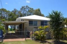  90 Kingfisher Parade Toogoom QLD 4655 $695,000 "BEACHSIDE" Located on the beachfront in a fabulous location this home has it all. With quality finishes and stunning ocean views. Designed for minimum maintenance, with high ceilings and a separate full self-contained parents retreat it sports: * Leadlight windows, rosewood floors and feature walls, large and open living & lounge areas with recessed storage areas. * 4 Large bedrooms, main bedroom with ocean views, separate parents retreat (kitchenette, ensuite and dressing room). All bedrooms have ceiling height built-ins and ceiling fans * Hugh bathroom with shower and spa bath, separate toilet * Modern rosewood and stainless steel kitchen with views to the beach * Large covered outdoor entertainment area with BBQ and fully screened. This home has been especially designed for beachside living and outside boasts low maintenance features, with sandstone base, and weather-side walls to no maintenance weatherboard cladding and soffit linings. Wide green lawns and cosy secluded landscaped gardens ensure that no matter what time of day there is always somewhere to enjoy. The outside also boasts a beachside shower in its own private alcove and close by change room and laundry.  There is a full length carport long enough to house car and boat, plus a large lock-up boat garage with 3m high roller doors. There is also under house storage areas with wide lockable doors. Other features: Built-In Wardrobes,Secure Parking,Polished Timber Floor,Terrace/Balcony Property Details Elders Property ID: 9101338 4 bedrooms 2 bathrooms 2 car parks Land Area 600 square metres Single garage Single carport 