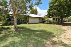  45 Cambridge St Charters Towers QLD 4820 $265,000 **IMMACULATE FAMILY HOME & SHED PACKAGE CLOSE TO CBD** Property ID: 2173618 Just a short distance from the Charters Towers CBD is this well presented 3 bedroom block family home and shed package on a 1003m2 Block. Internally the home is open planned and well-appointed and spacious and features open planned living areas and generous bedrooms, the home has ducted evaporative air-conditioning throughout for comfort during the warmer months plus the master bedroom has an additional box air conditioner. Entertainment wise the home features a front verandah which leads into a double carport which would double as the entertainment, rumpus or play area or there is the huge 3 bay Colorbond powered shed with full length awning.  Outside the home there is manicured lawns and established gardens and the block is fully fenced with steel fencing and 2 x double gates both lockable. This property truly is well worth your time inspecting and definitely caters for all members of the family. Location is impeccable as it is just a short distance to the CBD, Sporting facilities as well as reputable education facilities. Contact Raine & Horne Charters Towers today and arrange and appointment. Features: Block: 1003m2 fully fenced with lockable gate access to both carport and shed area. Home: Masonary block construction. Bedrooms: 3 Spacious Bedrooms, Evaporative a/c throughout, master has built ins plus additional box a/c and  remaining bedrooms have room for built ins. Kitchen/Dining/Lounge: Spacious, open planned, front verandah access as well as rear yard access from dining, ducted  evaporative a/c throughout. Kitchen has plenty of cupboard and bench space and overlooks the rear yard. Laundry: Internal laundry with double stainless tub, outside access and room for built-in storage. Bathroom: Tiled bathroom, with built in linen cupboard, shower over bath recess, vanity, separate toilet. Carport: double carport with lockable storage facility. Carport could double as an entertainment or undercover area  as there is additional off street parking at the shed. Shed: State of the art 3 bay powered Colorbond shed with 3 roller doors and full length awning. Security Screens throughout. Solar hot water. Here is an opportunity to secure a practicle solid spacious family home with killer shed and yard area so close to the CBD. Contact Lisa Palmer on 0438 852 136 ASAP as this property will not last long. Land Area 	 1,003.0 sqm 