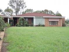  128 Mount Stanley Rd East Nanango QLD 4615 $299,000 ONE ACRE WITH MASSIVE SHED Property ID: 7457870 This was an executive brick home in it’s day, and you can still see the style today. The home offers 4 over-sized bedroom with built-in robes, plus a computer nook. Then you have an open plan kitchen/dining/lounge area with a wood heater. Plus a sunken lounge or rumpus room. The laundry is also over-sized.  Then when you step outside you find that the shed too is over-sized. Previously it housed 3 buses, so you could say there is ‘room to move’ in it. It also has power and lights. The location puts you about 1 km into town, but you do not have town water or sewer. This means that your rates are cheaper. The previous owner had pensioner discounts, but without the discount the rates should be about $1300 pa. Well worth a look, and if you leave it too long the current owners are likely to rent it out. So hurry. Land Area 	 4,034.0 sqm 