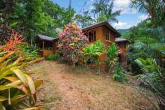  18 Nicole Dr Cape Tribulation QLD 4873 $399,000 Palm paradise with ocean view Property ID: 3115151 *Located in the superb cul de sac end of Nicole Drive in Cape Trib *With Mount Sorrow for a backdrop and looking out to the coral sea *This 4 Bedroom 2 Bathroom beautiful timber home is set amoungst a rare and divine tropical palm plantation. *Four bedrooms, with the option to open up bedrroom 3 as an extension of the generous sized verandah area. 2 Bathrooms, both present beautifully.(Shower, vanity and loo) 3.16 Ha (7.8 Acres) wth approx1-1.5 acres of cleared land Ocean view – from various standpoints on the property Solar Power (RAPS- Remote area power system) professionally installed, comprising Solar arrays, 24 volt battery bank, inverter and associated. *Aquifier on site with bore pump for filling the main house tank(5000lt) *Secondary tank, filled with Daintree rainwater for the gardens.(3000lt) Carport- Well constructed Steel and colorbond – drive thru with concrete floor *Separate laundry room *Separate Generator shed block built. *Separate Worshop undercover area. Home built early 1980’s Renovations- 1998 and 2001 *This property will be sold *Please contact Mark Whitham Daintree Sales specialist on 0419 735 943 or mark.whitham@mossman.rh.com.au *Inspections by appointment only. Land Area 	 3.18 hectares 