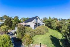  155 Gravelly Beach Rd Blackwall TAS 7275 $299,000 - $349,000 Low maintenance & private This open plan, clean-line contemporary style home is as neat as a pin, low maintenance and has the advantage of being able to be strata titled for your future investment or has enough room for a granny flat. (STCA). Situated in the peaceful area of Black wall with only minutes to the local shopping precinct, schools, boat ramp and set on an internal block of some 1503m2, the three bedroom color bond home was built in 2006 to accommodate a Northerly aspect with both river and rural views. Enjoy both morning and afternoon sun from any of the three decks, which provide extensive river and rural views while private, low maintenance, easy care gardens surround the home. Quality kitchen appliances including dishwasher and gas hot plates plus plenty of storage space and a handy island bench is a pleasure to cook in. Upstairs a massive open room provides the flexibility to become a parents retreat, rumpus room or whatever you desire. 2 double bedrooms downstairs and a combined bathroom/laundry are located off the open plan living which is kept at a constant temperature via reverse cycle and wood heating.  The home is fully insulated and 'smart' glass helps to keep you cool in summer and warm in winter reducing your power bills. A double garage has workshop space and there is extra parking available for your caravan, boat and trailer on this easy care near level block. Get ready to simplify your life. Arrange your inspection today. General Features Property Type: House Bedrooms: 3 Bathrooms: 1 