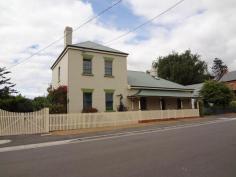  14 Lyttleton St Longford TAS 7301 $800,000 Historic "Lass O'Gowrie" circa 1846 This beautiful home in Lyttleton Street, Longford operated as the "Lass O'Gowrie" Hotel in 1846. The publican at the time was Alex Suter. Lass O'Gowrie later became a girls school run by the Misses Boyd. Today, Lass O'Gowrie is a substantial and gracious home located in ever popular Longford, well known for its historic significance including Georgian homes, churches and parks. Described as a two storey and single storey house, Lass O'Gowrie offers a versatile lifestyle comprising some 6 bedrooms and 2 bathrooms, a large country kitchen, formal sitting and dining rooms and a quaint self contained unit in the rear wing. A water panel heating system throughout the house provides warmth, with the option of a woodheater in the sitting room and open fireplaces in other rooms. Lass O'Gowrie is in excellent condition and is located so close to Launceston and the airport. General Features Property Type: House Bedrooms: 6 Bathrooms: 2 