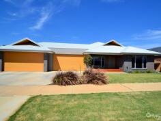  6 Durif Drive Moama NSW 2731 $695,000 Spacious Sophisticated Family Living Inspection Times: Sat 09/04/2016 09:30 AM to 10:30 AM Sun 10/04/2016 11:00 AM to 12:00 PM Situated on an approximate 1,000m2 allotment and less than 2 years old is this stunning five bedroom home. From the moment you open the front door you are graced with style and elegance.  The master bedroom includes a large walk in robe and ensuite with double vanity, waterfall shower and separate toilet.  The spacious spare bedrooms also have walk in robes and ceiling fans and the fifth bedroom located at the front of the home can be utilised as a home office with a hidden desk in the large built in robe.  The main bathroom features a bath and waterfall shower as well as a separate powder room.  The polished concrete floors feature hydronic floor heating and lead you through to the large open plan kitchen featuring a large breakfast bar with stone bench tops, stainless steel appliances including dual ovens and butlers pantry.  The open plan dining and living areas all feature floor to ceiling windows and push back glass sliding doors to the large undercover entertaining area with automatic blinds, open fire and ceiling fans and is surrounded by landscaped gardens which are equipped with a full automatic sprinkler system.  The home also features a large laundry, drying closest, plenty of additional storage space, ducted evaporative cooling and ducted vacuum.  The four car garage has been built to fit large boats, caravans and 4WDs and has a separate toilet.  If you have been searching for your dream home then look no further. PROPERTY DETAILS $695,000 ID: 363901 Land Area: 1000 m² Building Area: 30 