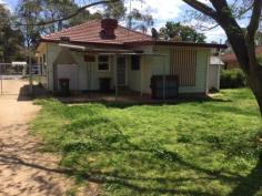  94 Rodd St Canowindra NSW 2804 $165,000 Home in Town on Half an Acre This three home is situated in a convenient position in town and is walking distance from shops, parks and schools. It sits on some 2023m2 square metres in area with an established stable, plus a side driveway that accesses the lock up garage and 2 carports. The lounge is oversized and boasts a slow combustion heater to warm you on those frosty nights. While there is ducted evaporative cooling throughout, for the warmer days. The kitchen is generous in its size and offers plenty of bench and cupboard space and could accommodate an additional breakfast table.  There is the opportunity to add your style or just move in and enjoy, the choice is yours. Perfect for the home buyer or some one who is looking to move into town keeping the feeling of space.   Property Snapshot  Property Type: House Construction: Brick Veneer Land Area: 2,023 m2 Features: Built-In-Robes Close to schools Close to Transport Fenced Yard Formal Lounge Garden Shed Town Sewer System Town Water Verandah 