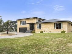  39 Snug Tiers Rd Snug TAS 7054 $599,000 If its space you're after, this property has it! This impressive double storey home has plenty of room for the entire family. Situated on a flat block (approx. 2378m2) where children and pets can safely play all day long. Park the caravan, boat, trailer and anything else… there is loads of room for everyone. Upon entering the home, the quality of the home is evident. All of the spacious bedrooms have built-in-robes and the master has walk-in-robes and an ensuite. The top level of the home has two great entertaining areas. One being the tasteful kitchen/dining/lounge area and adjacent is the family/theatre room that has its own projector screen and speaker system. There is even a great built-in bar. Also off the top level is an enormous suspended concrete deck with full length cover making it the ideal alfresco dining or party area. The house has nice views of the D'entrecasteaux Channel to Bruny Island also lovely views of Mount Wellington. The entire home has ducted air conditioning, regulating the temperature throughout the year. Ground level has a remote controlled double garage, big laundry and 2 multi-purpose utility rooms. A short stroll down the road has Snug Primary school, shops and services all well within your sights. So if it is space you're after, this modern, spacious home is well worth a look.   Property Snapshot  Property Type: House House Size: 306.58 m2 Land Area: 2,378 m2 Features: Airconditioning Built-In-Robes Dishwasher Ensuite Verandah Walk-In-Robes 