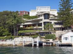  110 Wolseley Rd Point Piper NSW 2027 A Waterfront Masterpiece on Sydney Harbour Unequalled luxury and classic contemporary elegance personified. Nothing was overlooked in achieving perfection and 110 Wolseley Road is assuredly one of the world's most prized private waterfront trophy holdings.  Featuring boating facilities and a private jetty to welcome guests arriving by water-taxi, this breathtaking residence leads out to sundrenched sweeping sandstone terraces, easycare garden areas and a heated pool alongside the harbour's edge. Magnificent interiors of extraordinary quality define the connoisseurs approach to fine living. Exacting details incorporated throughout the home, provide a haven of exquisite excellence for private relaxation and lavish entertaining. Quite simply, the best. Boasting approximately 27m frontage to Sydney Harbour, the point-blank views are spectacular both day and night and are showcased throughout the residence. The dazzling panoramic views display the Sydney Harbour Bridge, the CBD and the entire magnificence of the world's most beautiful harbour. Yet 110 Wolseley Road is utterly private, with its inventive architecture drawing in such immense views while maintaining total seclusion from the road, the neighbours and the harbour. - Bespoke glass-view elevator access to all 3 levels of accommodation  - Vast main living area, dining conservatory with domed ceiling  - Family living areas, separate home office, guest powder room  - Palatial master wing with private study, sitting area, his & her walk-in wardrobe,  opulent en-suite bathroom  - 2 additional bedroom wings with 2 en-suite bathrooms & walk-in robes  - Potential to add 2-3 bedrooms to the existing floorplan - Chef's dream kitchen, bar & wine cellar includes integrated ice-maker, glass-washer,  bottle-chiller, Gaggenau cooktop & 2 double ovens, 2 commercial grade refrigerators, 2 dishwashers, filtered water system, butlers pantry - Maytag internal laundry room, marble slab heated interior floors  - 2 marble fireplaces, surround sound, motorised awnings & shutters,  ducted zoned r/c air conditioning - Established low maintenance greenery, automatic watering system  - Electronic security gates, antique wrought iron foyer gates, state of the art security  - Parking for 4 or more cars  Incomparable in every way and located on Australia's most prestigious peninsula, 110 Wolseley Road, Point Piper is the ultimate waterfront address.   Property Snapshot  Property Type: House Features: Pool 