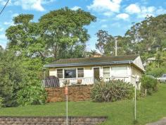  135 Brisbane Water Dr Point Clare NSW 2250 $410,000 - $430,000 "Be Quick For This" Affordable 2 bedroom cottage set on a gently sloping block offering a sunny Northerly aspect. Perfect opportunity for the first home buyer to secure a home in this much sought after suburb. Featuring large open plan lounge and dining room and 2 good size bedrooms. * 531sqm block with entry off Lorraine Avenue * Leafy district views * Generous size, fenced yard * Comfortable walking distance to shops, bus, rail, waterfront and short driving distance to M1 motorway Rates - $1,228.94 pa   Property Snapshot  Property Type: House Land Area: 531 m2 