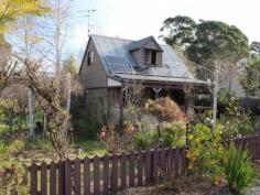  22 Hoyer St Cobargo NSW 2550 $269,000 COTTAGE CHARM L5698. Immaculately presented, this charming and cosy 2 bedroom cottage will absolutely delight you.  Living areas are warm and inviting, with slow combustion wood heating in the lounge, as well as the options of gas heating and RCAC. The kitchen is neat and super practical and the separate dining could easily become a 3rd bedroom if required.  The main bedroom is light with a lovely outlook, features built in robes and adjoins the modern 2 way bathroom.  The upstairs loft style bedroom is very spacious and could accommodate a parent's retreat or be a delightful room for a few children.  Set on a large level block amongst beautiful cottage gardens at the front and large park like setting at the rear.  A very special home that will be a joy to live in.   Property Snapshot  Property Type: House 