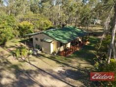  1168 Teviot Road Jimboomba QLD 4280 $389,000 Cute Cottage on 3 Elevated Acres Enjoying a prime, elevated position within easy reach of shops, parks and schools, with enough room for a horse, or yard space for vehicles and equipment, this neat and tidy 3 bedroom cottage is ready to move in and enjoy, or perhaps rent out. You might even be able to build a 2nd home and use this as the granny flat - plenty of options to consider. Positioned a few Ks west of Jimboomba, just outside Flagstone, your inspection will reveal a good useable 3 acres, with the added bonus of an open workshop adjacent to an enclosed 9m x 6m shed, which also happens to have 3 Phase power. There’s even a separate chook shed as well. The Cottage is ready to move in and enjoy. You will find 3 bedrooms, two of which enjoy views over the front of the property while the other enjoys views to the back paddock. The outlook in every direction is good, thanks to the mature gardens and the positioning of the house on the block.  You will also find two living areas and the wood has already been cut and stacked, ready to feed the combustion heater this winter! The kitchen is open plan to the dining area, while the bathroom has recently been upgraded with a new vanity unit, so no money to spend there. Moving back outside, you’ll find a shallow front veranda and a deeper back veranda, plenty of room to sit back and relax on a warm summer evening.  Lots to like here and lots of options too, to develop at a later date. Position is everything and this one must surely be ideal with such a wide range of facilities close by, yet still enjoying an elevated and surprisingly peaceful aspect. Call me to arrange your personal inspection – it may be gone by the 1st open home … Property Details Elders Property ID: 9420170 3 bedrooms 1 bathrooms 2 car parks Land Area 3 acres Double garage Related Elders Services Elders Home Loans Find a Broker | 1300 LENDING Elders Insurance Request a Quote | 13 LOCAL 