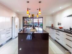  9 Kardinia St Minyama QLD 4575  $799,000 MAGIC IN MINYAMA! Inspection Times: Sat 02/07/2016 10:00 AM to 10:45 AM All the hard work has been done in this beautifully renovated, single level home.  Kardinia Street is a much sort after address in Minyama. Rarely does a home here come to the market and it is known for its quiet, leafy street and offers a short, flat walk to the main river, parks, canals, public transport and shops.  The owners have meticulously gone through the home, room by room leaving no stone unturned, resulting in a stunning finish which is an absolute credit to them. The end result is a culmination of careful planning, patience and plain hard work which can only be truly appreciated with your early inspection of the property.  There are so many features to the home, but perhaps the biggest feature is the much sort after option of dual occupancy if needed. Currently used as an entertainment area and housing a pool table, the room (approx. 7.0x5.5mtrs) offers a separate full kitchen, separate ensuite and has its own private entry from the garage. To the side of this room is a covered, sunny, private tiled deck which overlooks the fully fenced grassed area and garden which offers plenty of room for a pool and is the perfect spot for reading a book or taking in the garden view.  The main house offers four bedrooms. The master is air-conditioned and has a gorgeous ensuite featuring a large double shower, twin basins and a large walk in robe. Further down the hall and servicing the other three bedrooms, is the main bathroom incorporating a "proper" spa bath with overhead shower. The separate toilet is next to the bathroom. Additionally, all four bedrooms have ceiling fans and there is security screens throughout most of the home.  To coin the phrase "A chefs dream" doesn't do this kitchen justice. Complete with dual ovens, boiling water on tap, filtered cold water, dishwasher, gas hot plates, in sinkerator garbage disposal, and a very generous amount of cupboard space with stainless steel racking inside the pantry, the chef in your life is more than well catered for. The beautiful marble island bench completes the picture allowing for guests to sit and converse whilst dinner is being prepared! Stepping out from the kitchen you are greeted by a huge, fully covered entertainment area complete with an outdoor kitchen, barbeque and purpose built entertainment hub.  The lounge/dining room is of open plan however there is a separate, private media room at the end of the home, perfect for the kids or for some time out for the adults. If needed, this could easily be converted to become the fifth bedroom. Conveniently, the home has been wired with Cat 6 capacity cabling which allows for all internal entertainment areas to communicate with each other.  Additionally, apart from the external spotlights, the lighting in the home is LED and low lumen fluros, both of which are very cost effective. The car accommodation has been well thought out with full height electronic gates with room to house three cars under cover. Here there is a cleverly hidden, double door, lockable storage area, perfect to house those nic nacks, tools etc as they are close at hand. There is also additional accommodation at the side of the house for a fourth car, jet ski, boat, trailer or caravan which has its own separate entry.  The gardener of the family will be pleased to know the property has its own bore which irrigates the main gardens including the grass mowing strip at the front of the home via pop up sprinklers hidden in the grass. Additionally, there is a separate tap connected to the bore for any hosing or washing of cars etc. Further, there is a 5000 litre underground rainwater tank that services the three toilets in the home and has an additional tap connected for external water use if required.  At the rear of the home are two large robust, indestructible work sheds. Currently, one is being used as a workshop and has a solid internal work bench included whist the other one is being used for storage. Perfect for the tradie or home handyman.  In summary, this is a home that truly offers so much to a diverse range of families, dependent on where they are with their lives now.  This property ticks all the boxes for the family and the extended family alike so call Gordon today to secure your private viewing.  - 	 4/5 bedroom home, main with ensuite  - 	 Separate media room  - 	 Dual living option  - 	 Separate entertainment room  - 	 Separate kitchen and ensuite  - 	 4 car accommodation  - 	 Room for jet skis, bikes etc  - 	 Oodles of storage  - 	 Large 663m2 block  - 	 Gas cooking and instantaneous gas hot water  - 	 Single level home with no stairs  PROPERTY DETAILS Offers Over $799,000 ID: 371702 Council Rates: $1,764.08 Land Area: 663 m² 