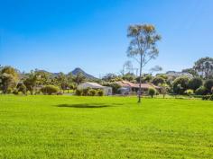  1632 Coolamon Scenic Dr Mullumbimby NSW 2482 $849,000 IDEAL LOCATION AND LIFESTYLE Grow your own food, fruit, free range eggs. Space for Children to play and your horse!  This is good life!  * 2.5 gentle acres, vegie gardens, fruit trees, town water and rural views * Walk to town, high school, golf or bowls. * Quality 4 bedroom home, spacious living areas and large outdoor living * Large Machinery shed with a WC and separate store room , 2 carports , sheds + solar power and hot water   Property Snapshot  Property Type: House Land Area: 2.50 acres Features: Close to schools Close to shops Close to Transport Family Room Formal Lounge Outdoor Living Rumpus Room Spa Storage 