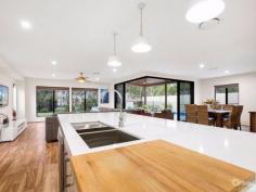  186 Balgownie Dr Peregian Springs QLD 4573 1,150,000 It does not come any better than this........ Sunshine Coast living doesn't get any better than this.  Set on a 788sq m north-facing block with views of the fifth fairway, this near-new Peregian Springs home is simply stunning.  Located close to local shops, schools, public transport and, of course, the golf course and club house, this home is in the heart of the luxurious Peregian Springs suburb.  Living is spread over two levels with plenty of room for the whole family plus guests in this four bedroom, two bathroom home.  The cleverly designed floor plan includes multiple living spaces to cater for a large family or for those who like to welcome guests.  The lower-level of the home features a separate media room and open-plan dining and lounge space that opens out to a covered entertaining deck, while a large living space is also located on the upper-level of the residence.  The modern kitchen overlooks the main living space and is sure to impress the home chef with features such as a double oven, gas cooktop, barbecue plate, beautiful cabinetry, butler's pantry, stone bench tops, dishwasher and built-in microwave.  When it comes to sleeping accommodation, there is ample space for everyone with three generous-sized bedrooms with walk-in robes all located on the upper-level of the residence, along with the main bathroom that features a double shower.  For those who prefer single-level living, the gorgeous master suite is located on the ground level and features a spacious ensuite complete with double shower, plus a walk-in robe.  Boasting low-maintenance gardens and a sparkling 13m easy-care, saltwater pool, the new owners can simply move in and make the most of their new enviable lifestyle.  There is also side access for a boat or caravan, room for a golf buggy and a garden shed accessible through the double garage, for those who love to garden.  This property also features tinted glass on the rear windows overlooking the golf course and the front door, a study under the stairwell, timber flooring throughout the lower-level of the home, ducted air-conditioning and vacuum system, and fans throughout.  PROPERTY DETAILS 1,150,000 ID: 356287 