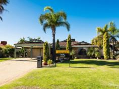  110 Kinross Dr Kinross WA 6028 $490,000 DON’T LET THIS ONE GET AWAY! Inspection Times: Sun 26/06/2016 01:00 PM to 01:30 PM Looking to purchase a spacious family home in a fabulous location? This is the perfect opportunity. It's ideally situated on a large 701m2 block; located in close proximity to schools, shops, parks and public transport. Tastefully decorated in neutral tones, this lovely 4x1 is move-in ready. Some of the highlights of this great property include:  Inside features:  -To the front of the home is the spacious front lounge room with large bay window  -Master bedroom is light and bright with built-in robe and access to the beautifully refurbished en suite  -Open plan kitchen, meals and informal lounge area  -Kitchen features S/S appliances including Bosch dishwasher, heaps of cupboard space and large, well appointed pantry  -Refurbished laundry with built in cupboards and toilet  -Bedrooms 2, 3 and 4 are double size with built-in robes  -Timber blinds throughout  -Wood look, easy care flooring to main areas  -Feature lighting  -Ducted evaporative A/C to keep you cool in the summer months  -Gas points  -Linen cupboard with built in shelving  Outside features:  -Glistening below ground pool with new fencing  -Large covered alfresco area, perfectly located next to the pool. Ready and waiting for your outdoor entertaining  -Spacious grassy area located to the rear of the home  -Low maintenance, reticulated gardens  -Large garden shed  -Double carport  PROPERTY DETAILS FROM $490,000 ID: 371989 Land Area: 701 m² 